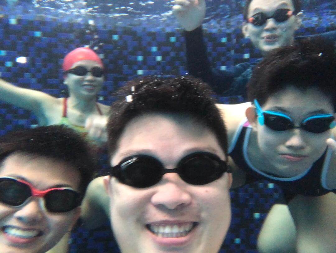 Animated adults that are wearing swimming suits